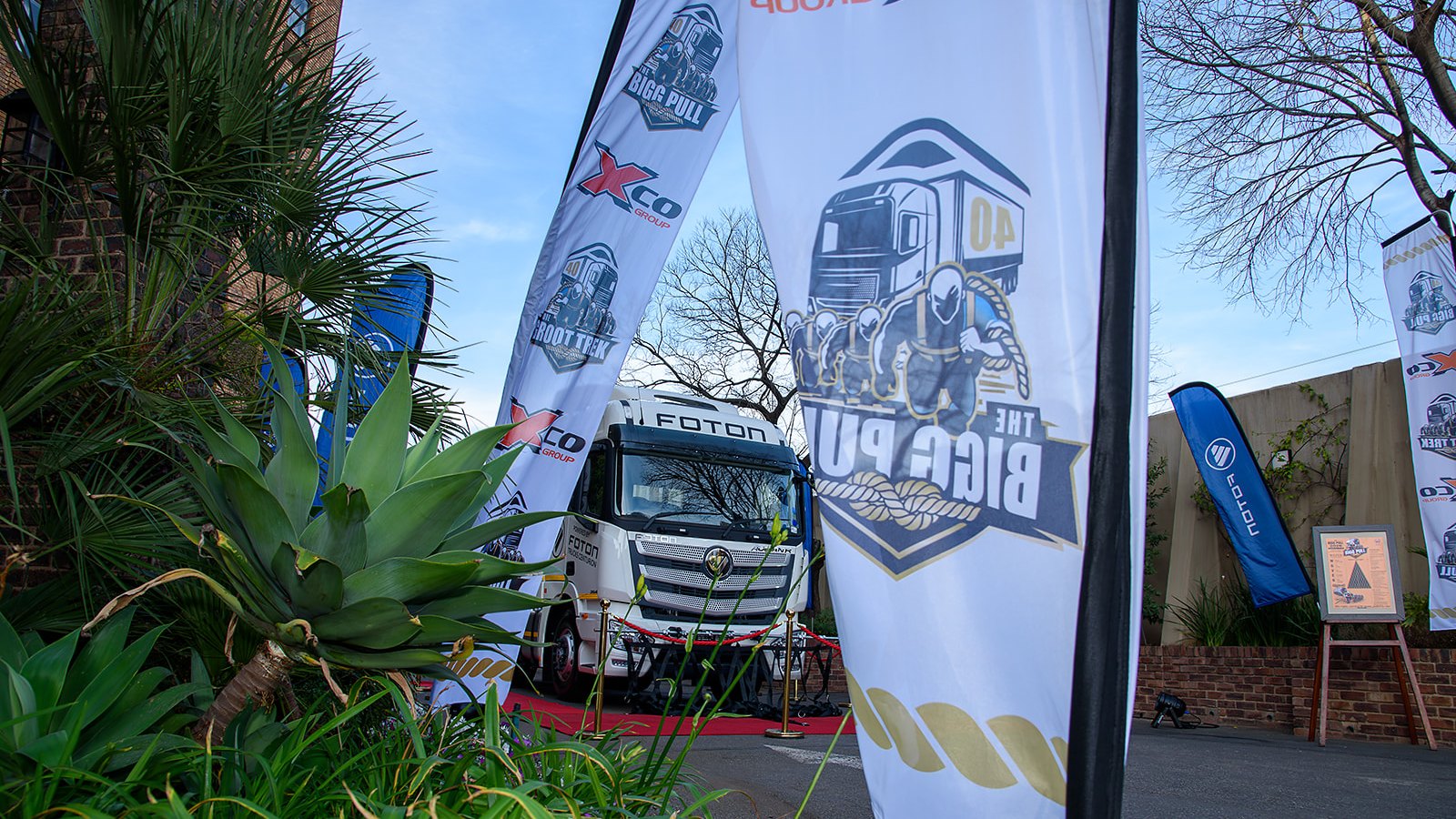 The Foton Auman R on the red carpet, framed by The Bigg Pull and XCO Group banners, at the media launch